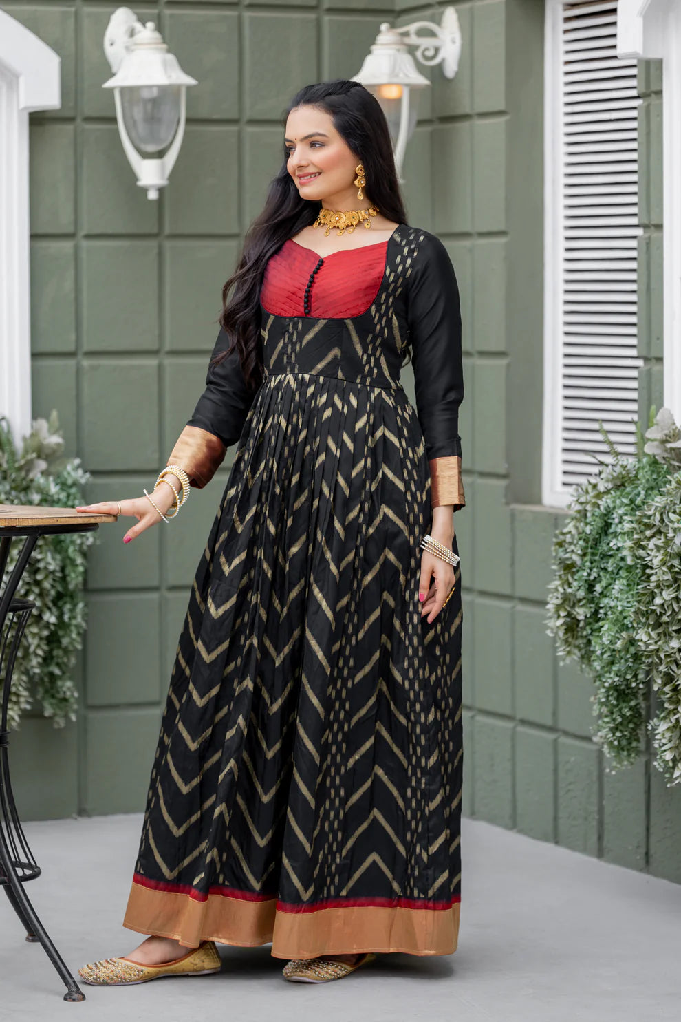 Dixz Fashion Chevron Zari-Woven Black Gown with Pleated Yoke & Zari Border Panel