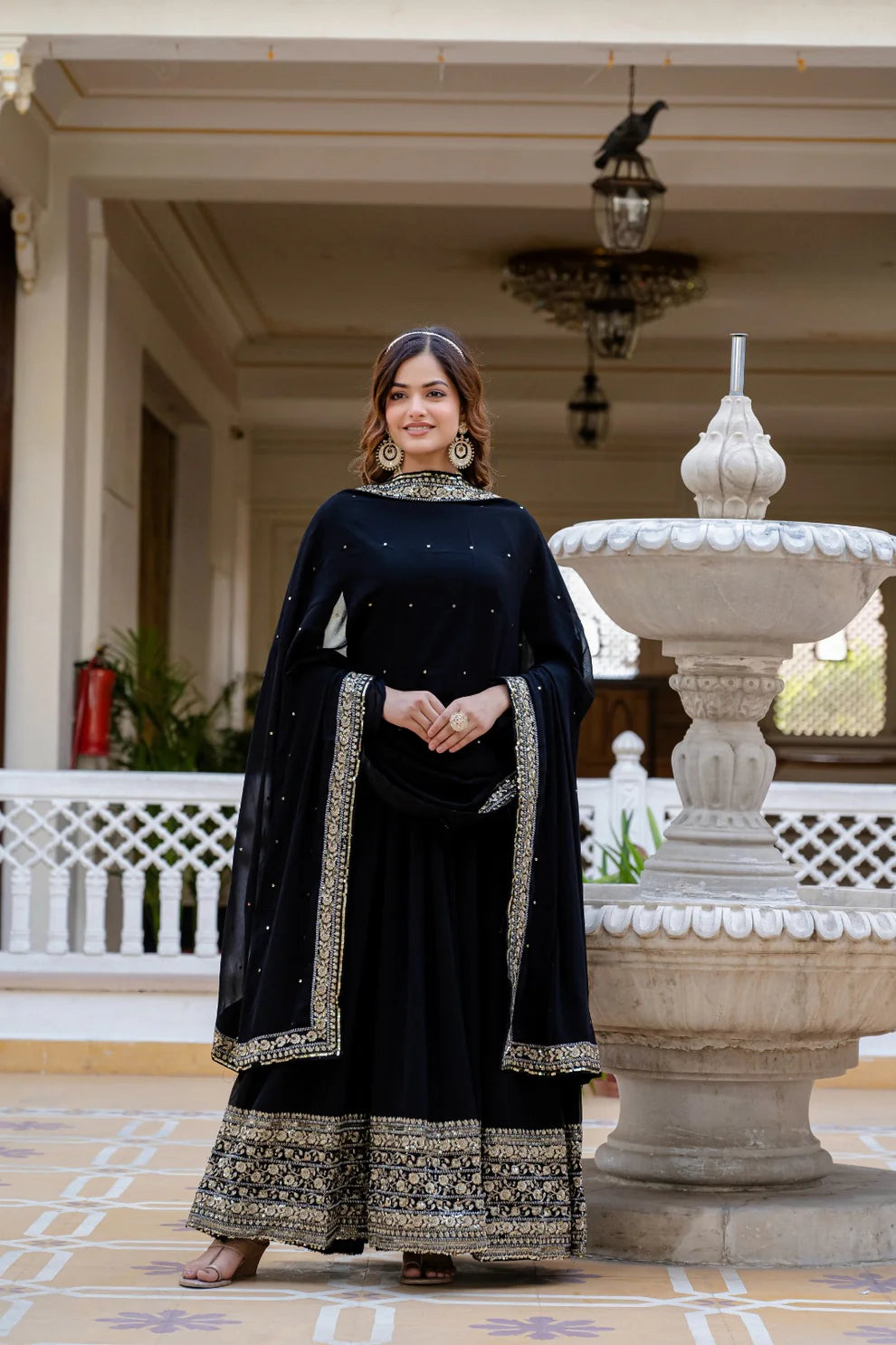 Dixz Fashion Faux Georgette With Sequins and Zari Embroidered Work Gown