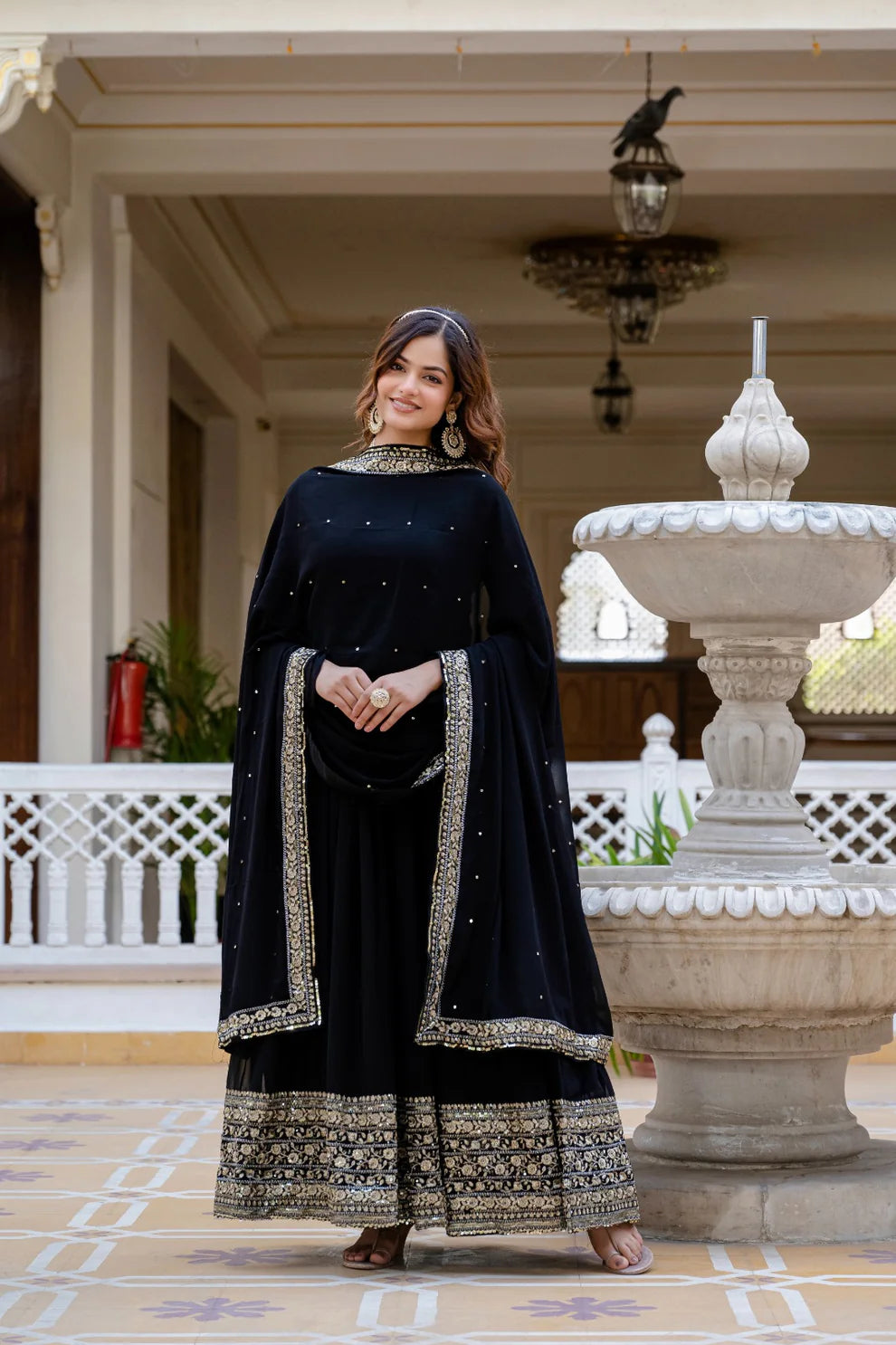 Dixz Fashion Faux Georgette With Sequins and Zari Embroidered Work Gown